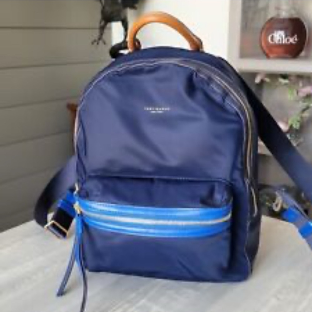 Tory Burch nylon backpack. Quilted interior.